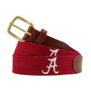Alabama Needlepoint Belt Garnet coiled, with brown leather trim and a brass buckle