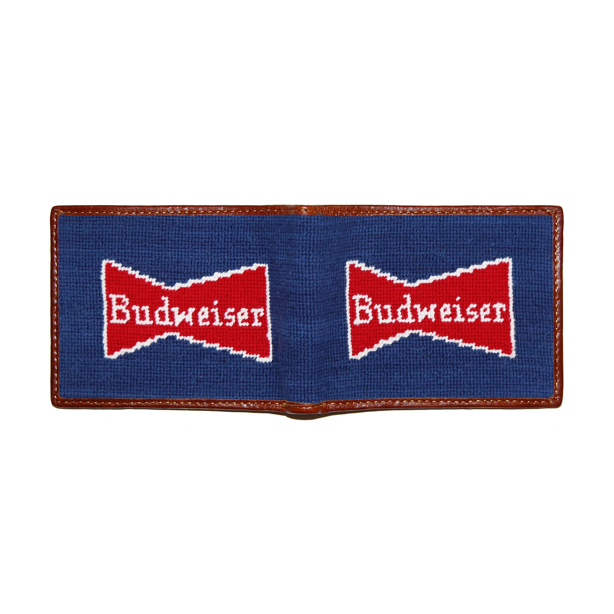 Anheuser-Busch Vintage Budweiser needlepoint bi-fold wallet in classic navy with chestnut leather trim, shown from secondary angle showing interior needlepoint.