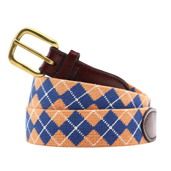 Blue and orange plaid belt with a brass buckle on a white background