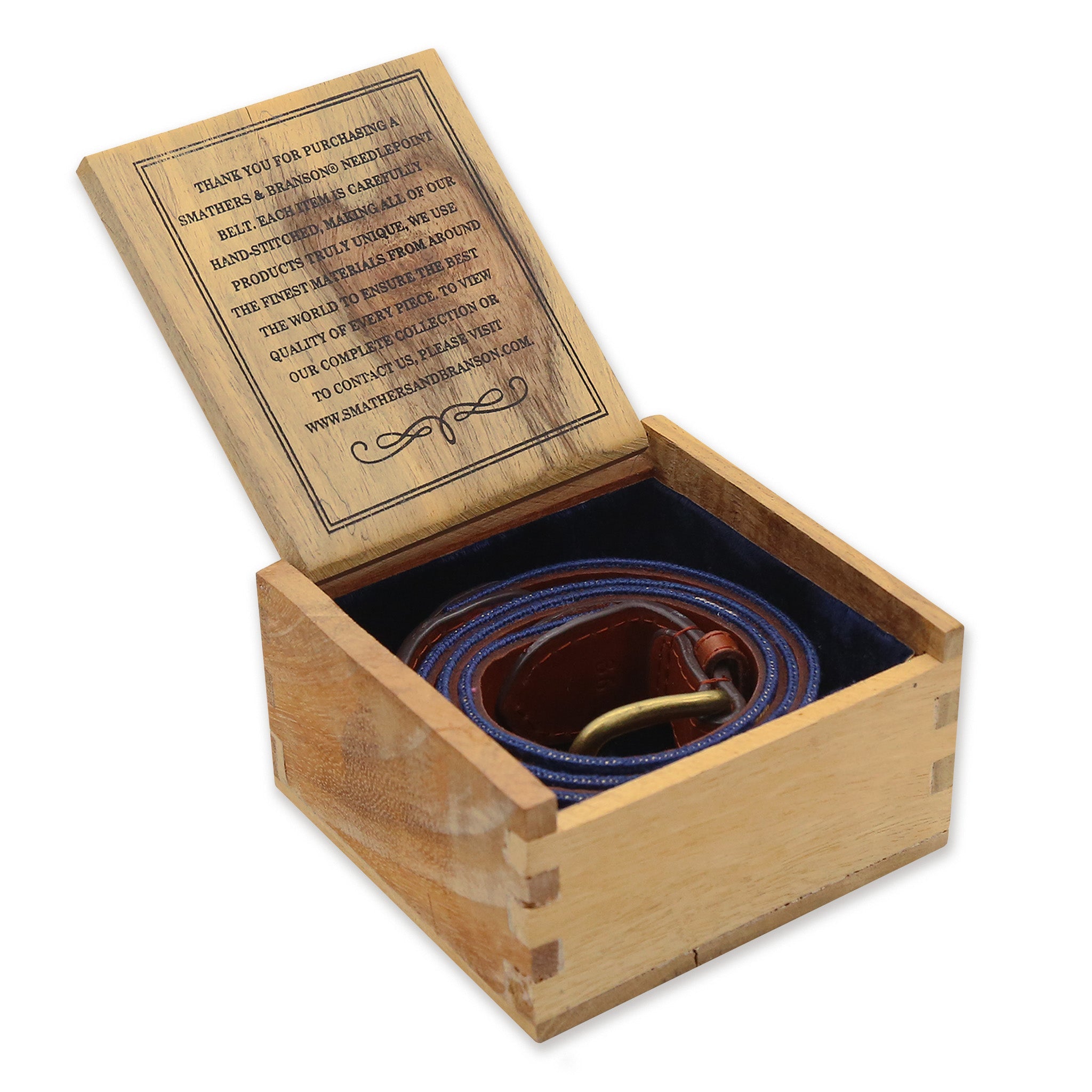 Smathers and Branson wooden belt gift box with hinged lid, natural oak grain, interior lined in black velvet; lid interior with a coiled belt inside