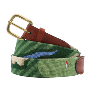 Birds Eye Golf Needlepoint Belt coiled, with brown leather trim and a brass buckle