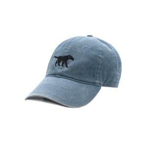Black Lab Walking needlepoint design on the front of a steel blue six-panel cotton hat.