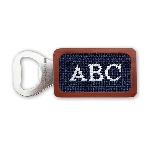 Dark navy needlepoint bottle opener with Block 10 monogram