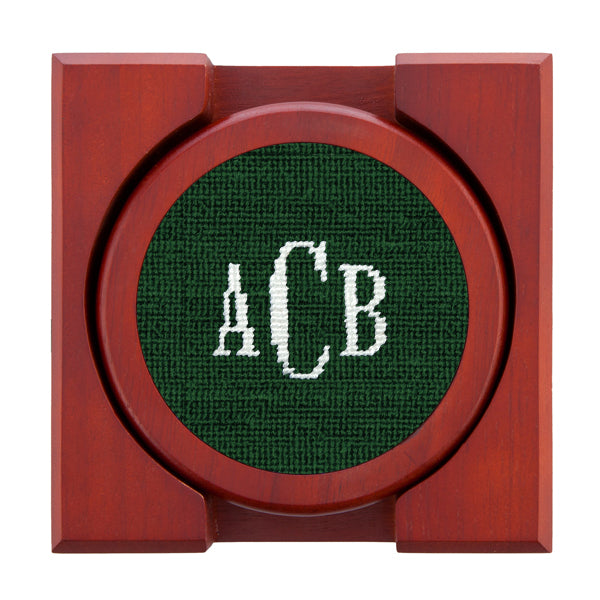 Set of four needlepoint coasters with Classic 24 monogram in hunter green
