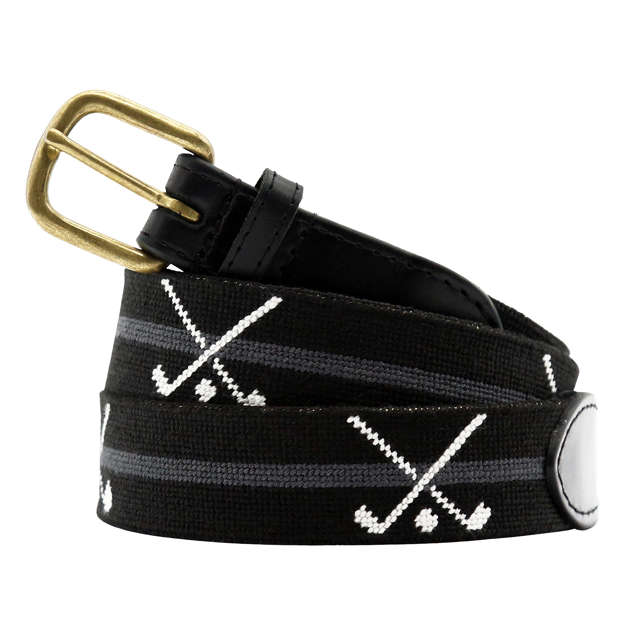 Black belt with gold buckle and white patterns on a white background