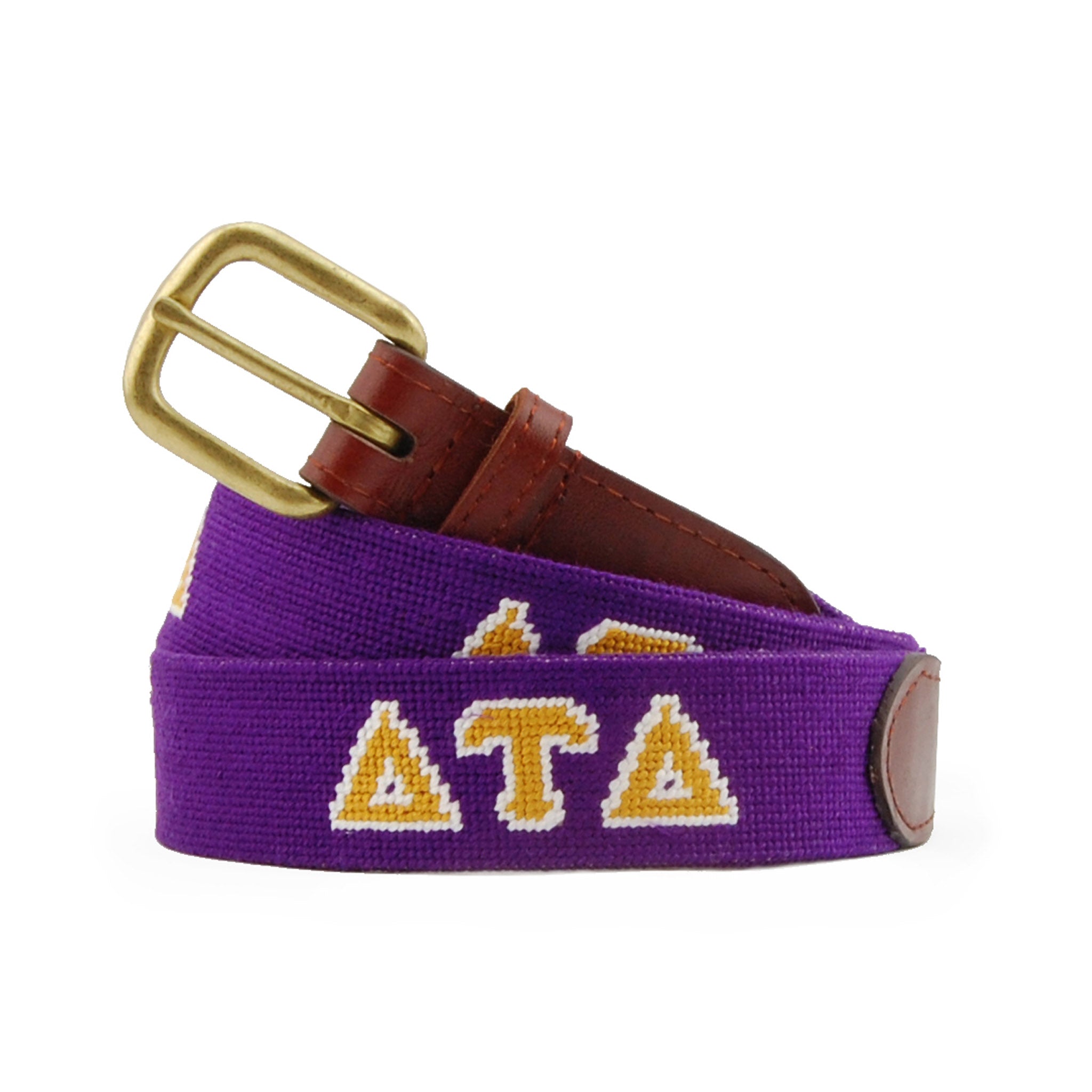 Delta Tau Delta Needlepoint Belt coiled, with brown leather trim and a brass buckle