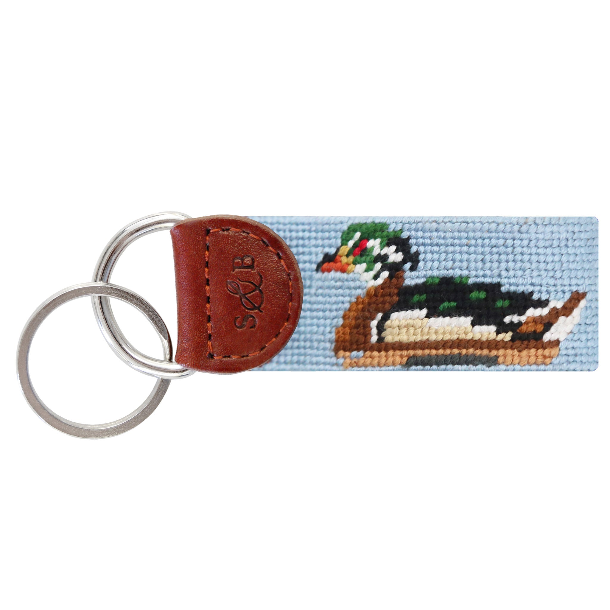 Antique blue needlepoint key fob with duck decoys in various colors, brown leather trim, and a metal key ring.
