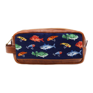 Dark navy needlepoint toiletry bag featuring the Fish and Tackle design with full grain Italian leather trim.