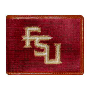 Florida State garnet and gold needlepoint bi-fold wallet with white “FSU” spear logo and brown leather trim, shown from primary angle.