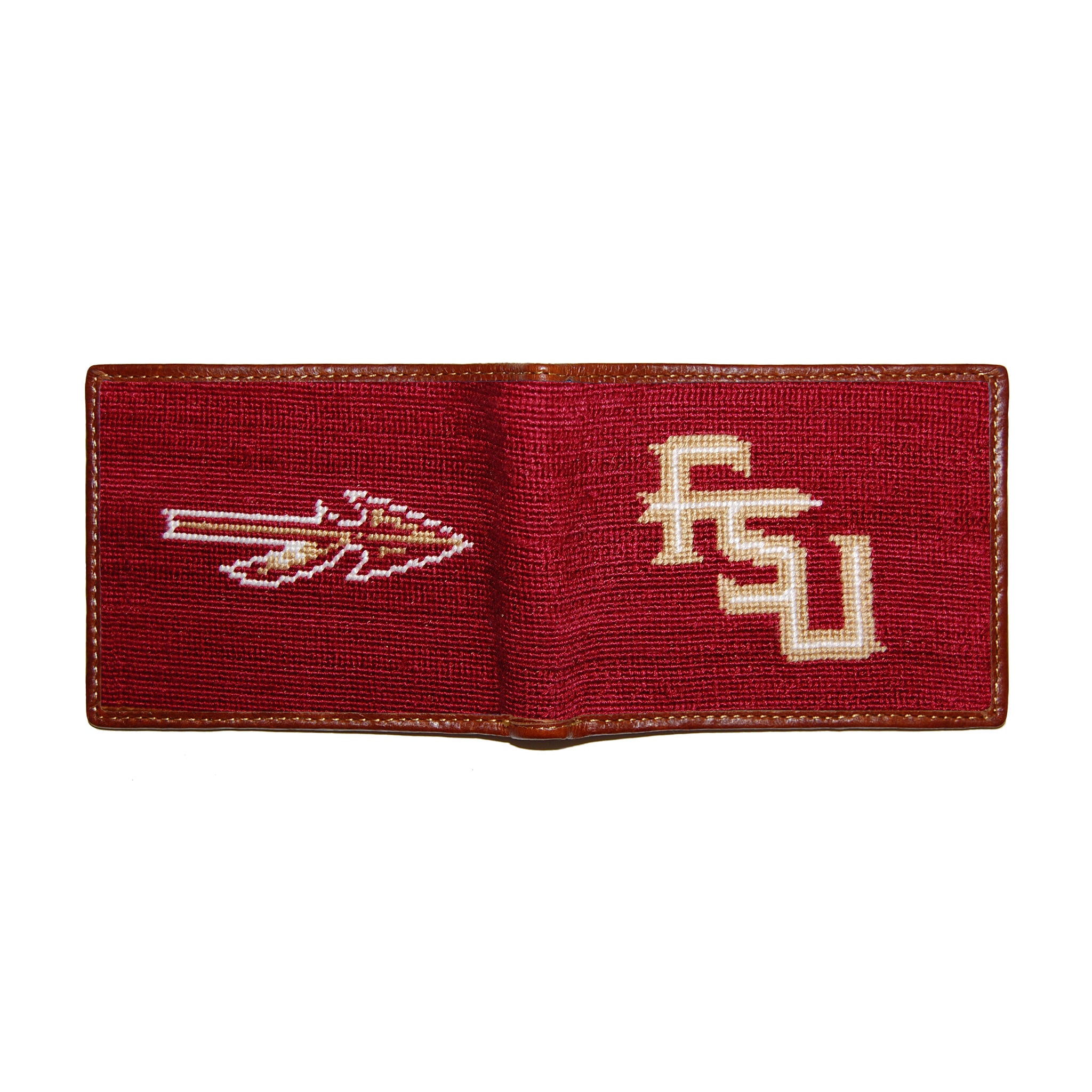 Florida State garnet and gold needlepoint bi-fold wallet open to show both sides of the white “FSU” spear logo needlepoint design with brown leather trim.