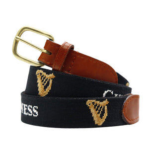 Guinness Needlepoint Belt Black coiled, with brown leather trim and a brass buckle