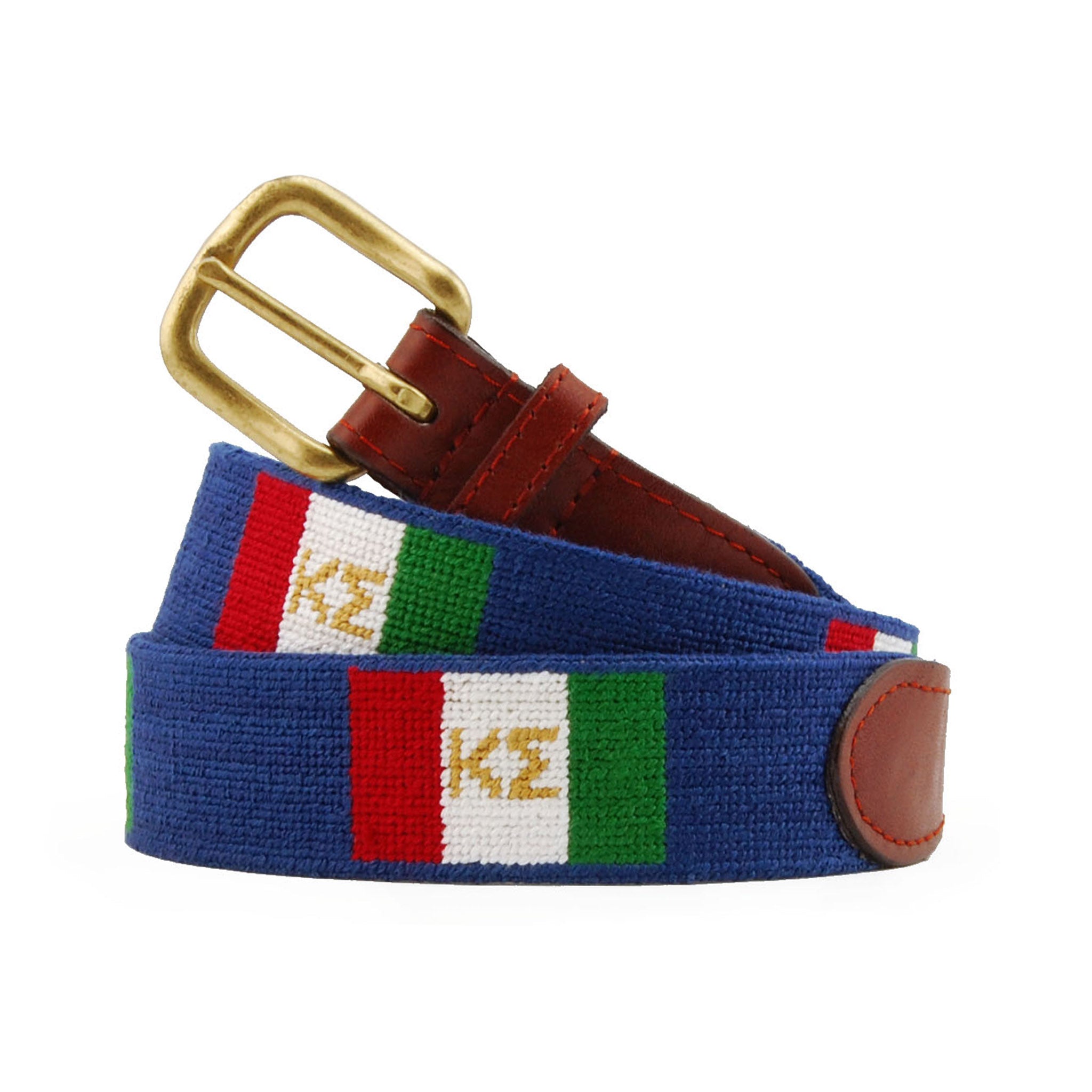 Kappa Sigma Needlepoint Belt coiled, with brown leather trim and a brass buckle