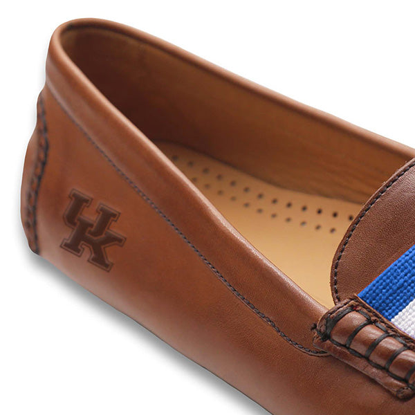 Shows the side view of the driving shoe with detailed needlepoint and leather construction.