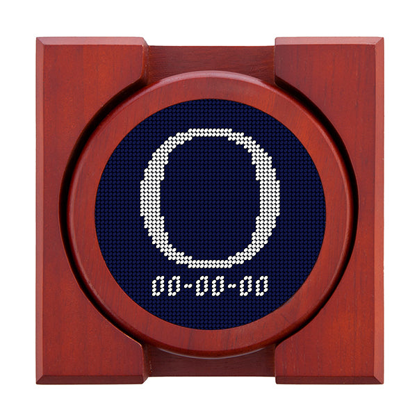 Dark Navy needlepoint coaster set featuring a white large embroidered letter above a custom date, framed with chestnut wood