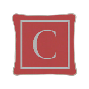 Letter "C" pillow stitch out in melon and white, showcasing a clean and elegant design.