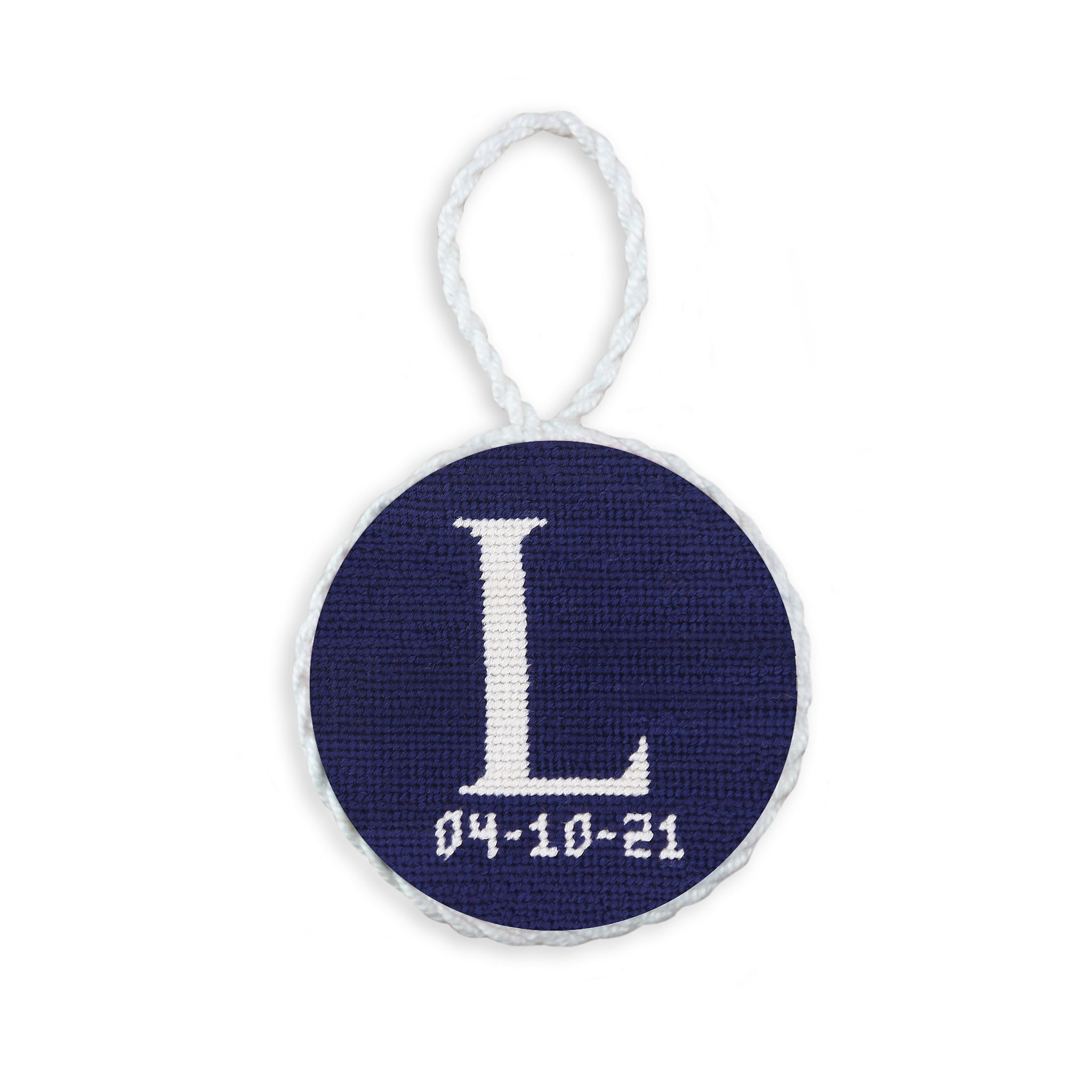 Dark Navy needlepoint ornament featuring a white large embroidered letter above a custom date, framed with decorative stitching and finished with a festive hanging loop.