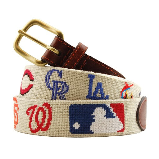 MLB National League Needlepoint Belt Light Khaki coiled, with brown leather trim and a brass buckle