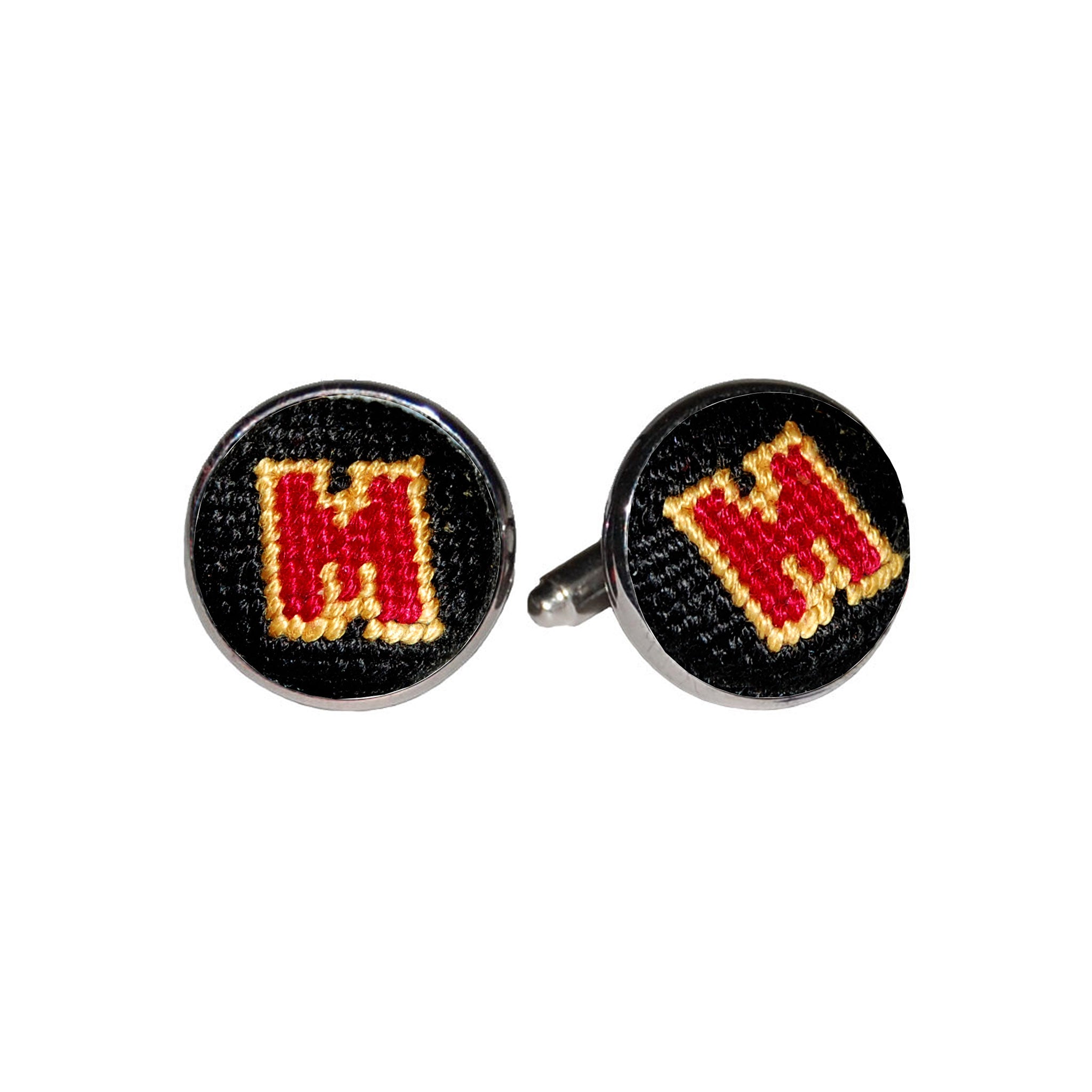 Maryland cufflinks with the red, white, black, and gold collegiate logo stitched in needlepoint, set into a silver-plated cufflink.