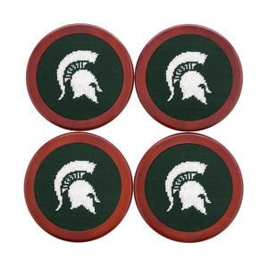 Dark pine coaster featuring the Michigan State Spartan logo stitched in white, shown laid flat.