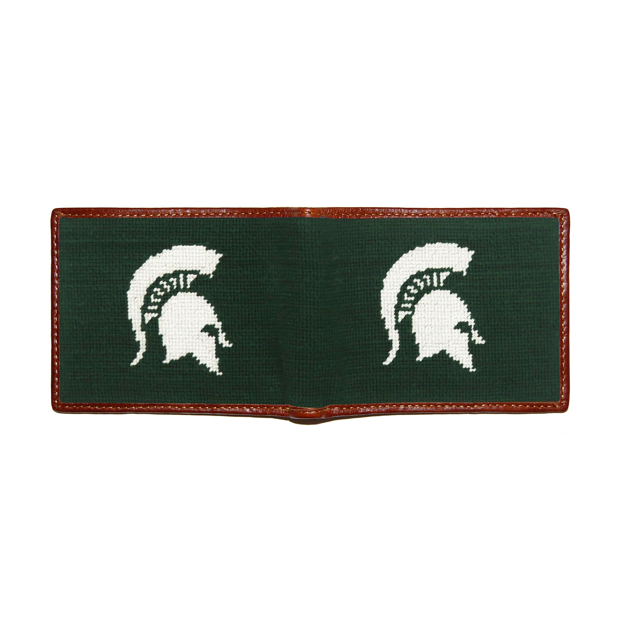 Michigan State Spartan needlepoint bi-fold wallet in dark pine with chestnut leather trim, shown from secondary angle showing interior needlepoint.