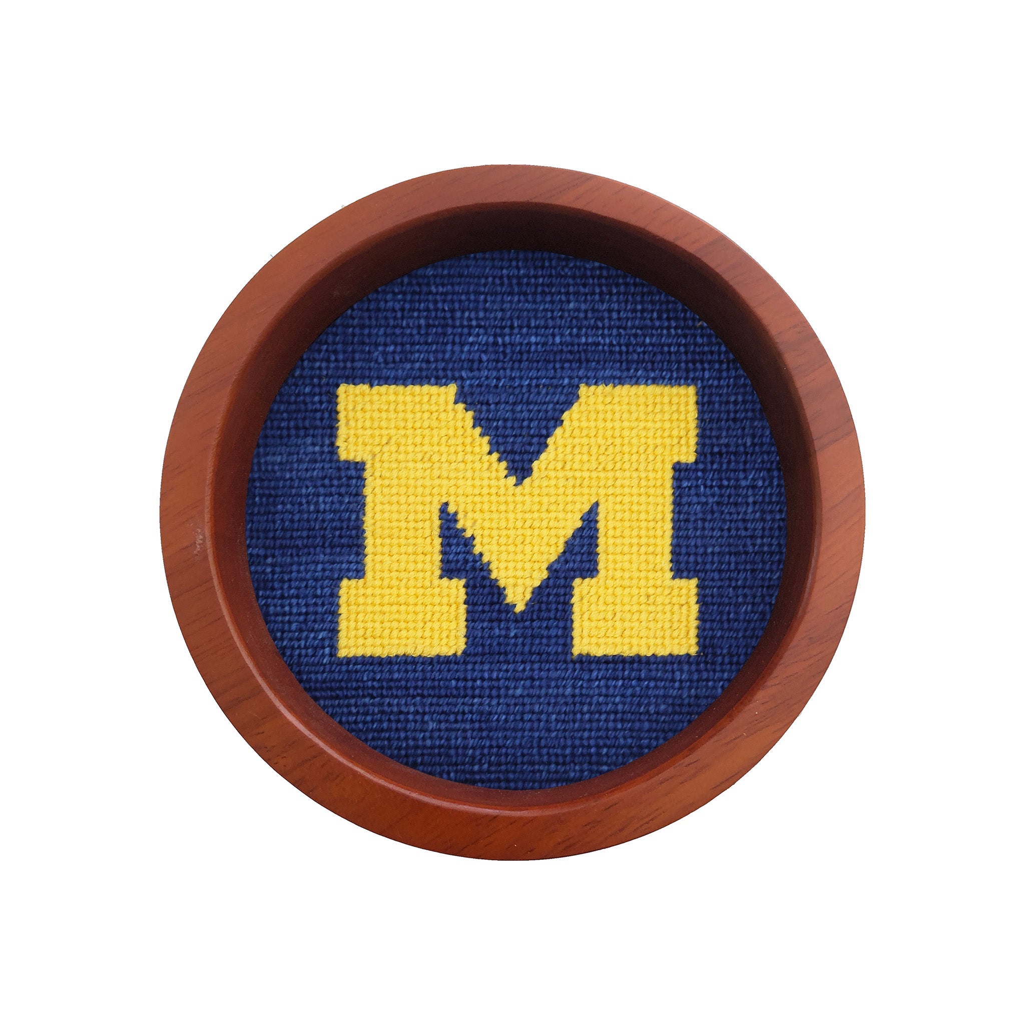 Round wooden wine bottle coaster featuring the Tennessee logo stitched in needlepoint.