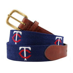 Minnesota Twins Needlepoint Belt Dark Navy coiled, with brown leather trim and a brass buckle