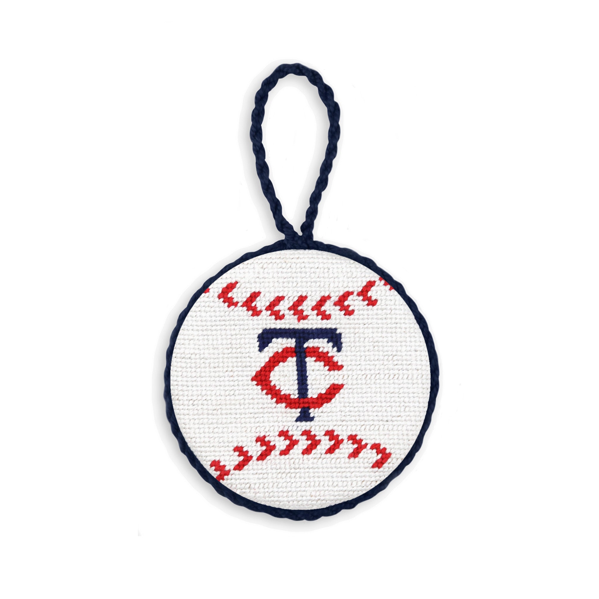 Navy needlepoint ornament featuring the red and white Minnesota Twins “TC” logo, finished with a white hanging cord.