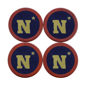 Navy needlepoint coaster set with the gold Navy “N” and star logo, finished with chestnut wood backing.