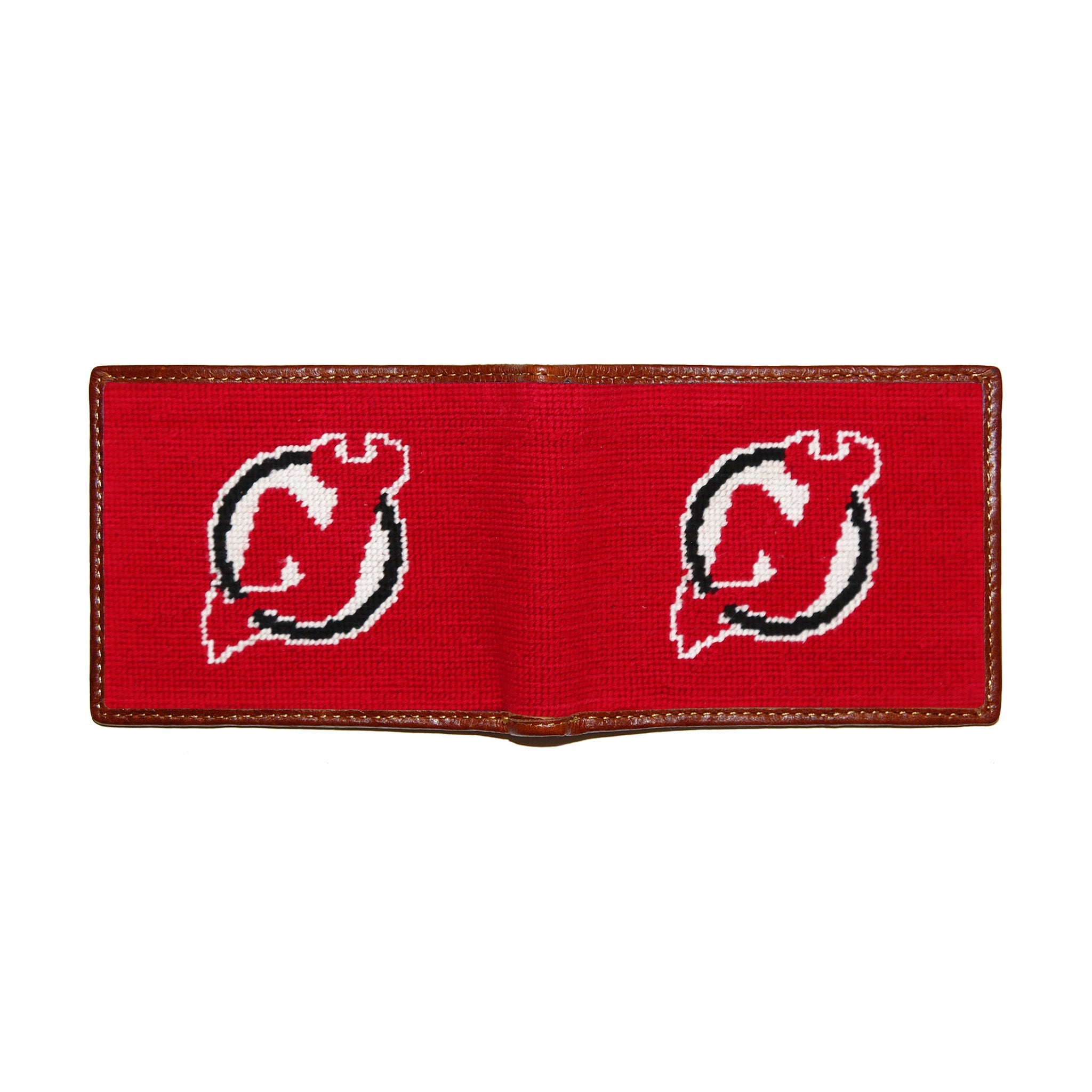 New Jersey Devils red and black needlepoint bi-fold wallet open to show both sides of the white “NJ” logo needlepoint design with brown leather trim.