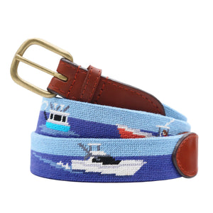 Offshore Fishing Needlepoint Belt coiled, with brown leather trim and a brass buckle