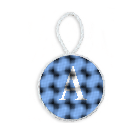 Baby Blue needlepoint ornament featuring a white large embroidered letter above a custom date, framed with decorative stitching and finished with a festive hanging loop.