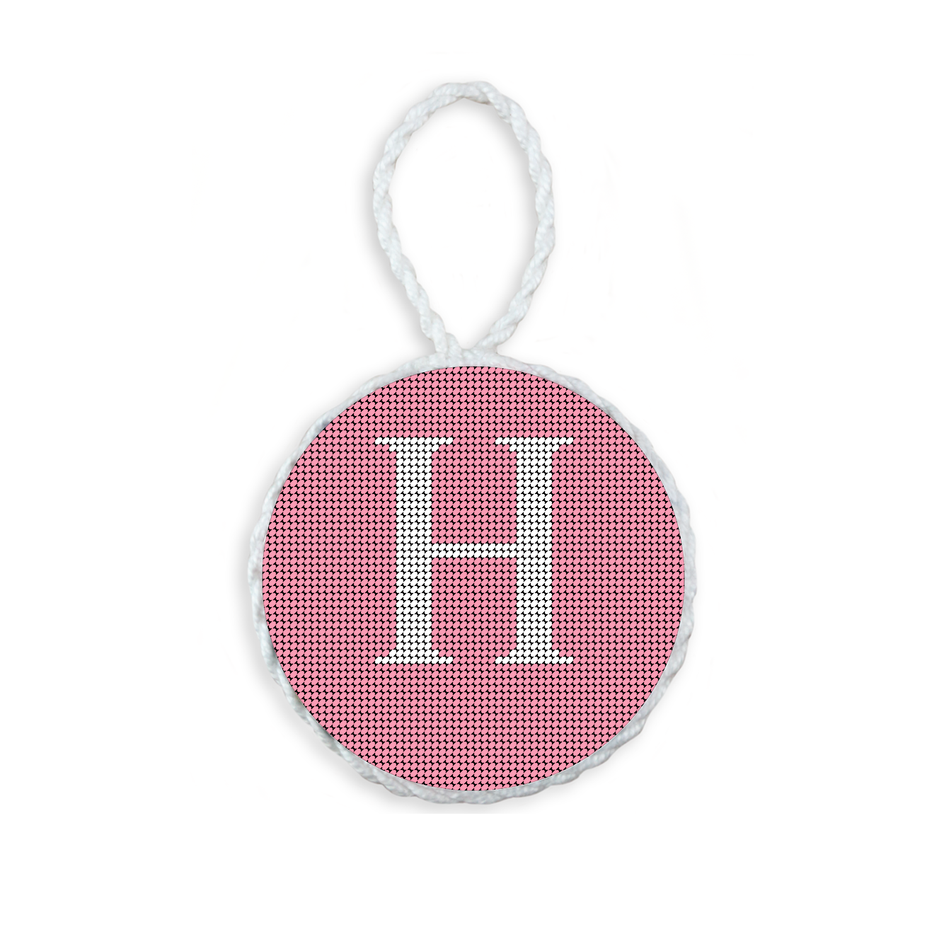 Pink needlepoint ornament featuring a white large embroidered letter above a custom date, framed with decorative stitching and finished with a festive hanging loop.