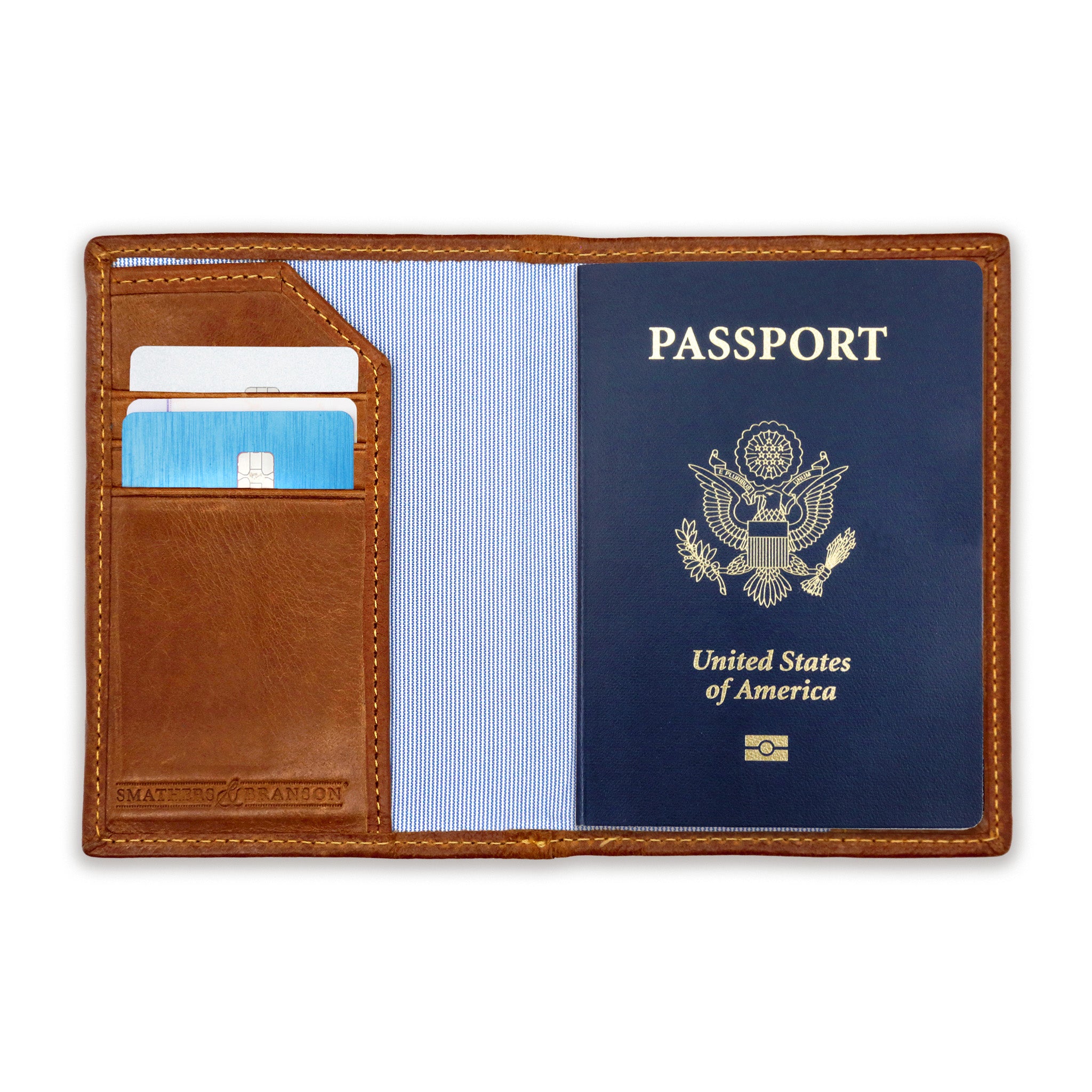 Interior view of the needlepoint passport case showing leather slots for cards and passport storage