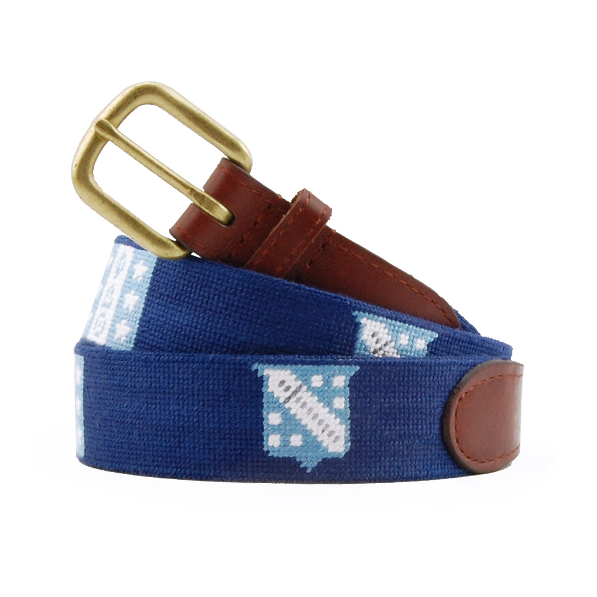 Phi Delta Theta Needlepoint Belt coiled, with brown leather trim and a brass buckle