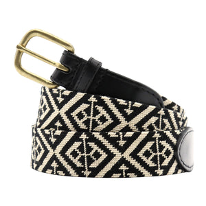 Black and beige patterned belt with a gold buckle on a white background