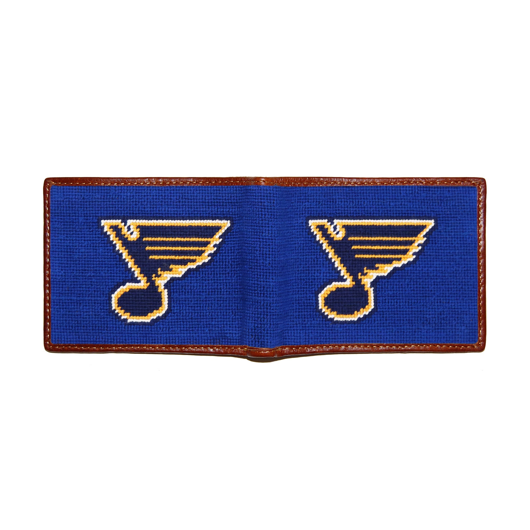 St. Louis Blues navy needlepoint bi-fold wallet open to show both sides of the yellow “Blues” music note logo needlepoint design with brown leather trim.