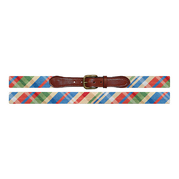 Colorful plaid belt with a brown leather buckle on a white background