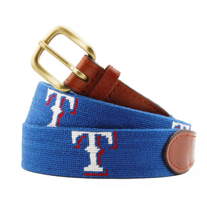 Monogrammed Texas Rangers Needlepoint Belt coiled, with brown leather trim and a brass buckle