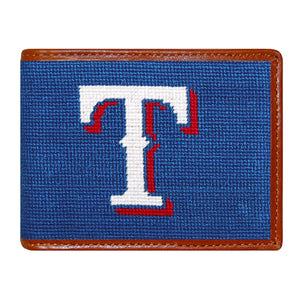 Texas Rangers navy needlepoint bi-fold wallet with red, white, and blue Rangers logo and brown leather trim, shown from primary angle.