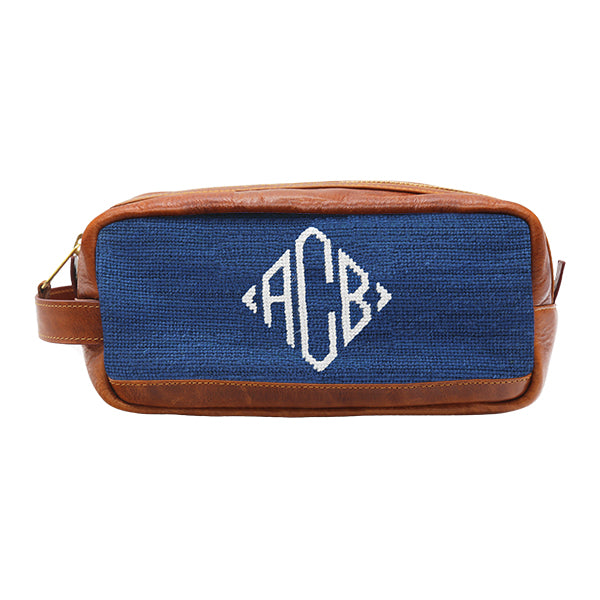 Hunter toiletry bag with diamond monogram pattern and full grain Italian leather trim.