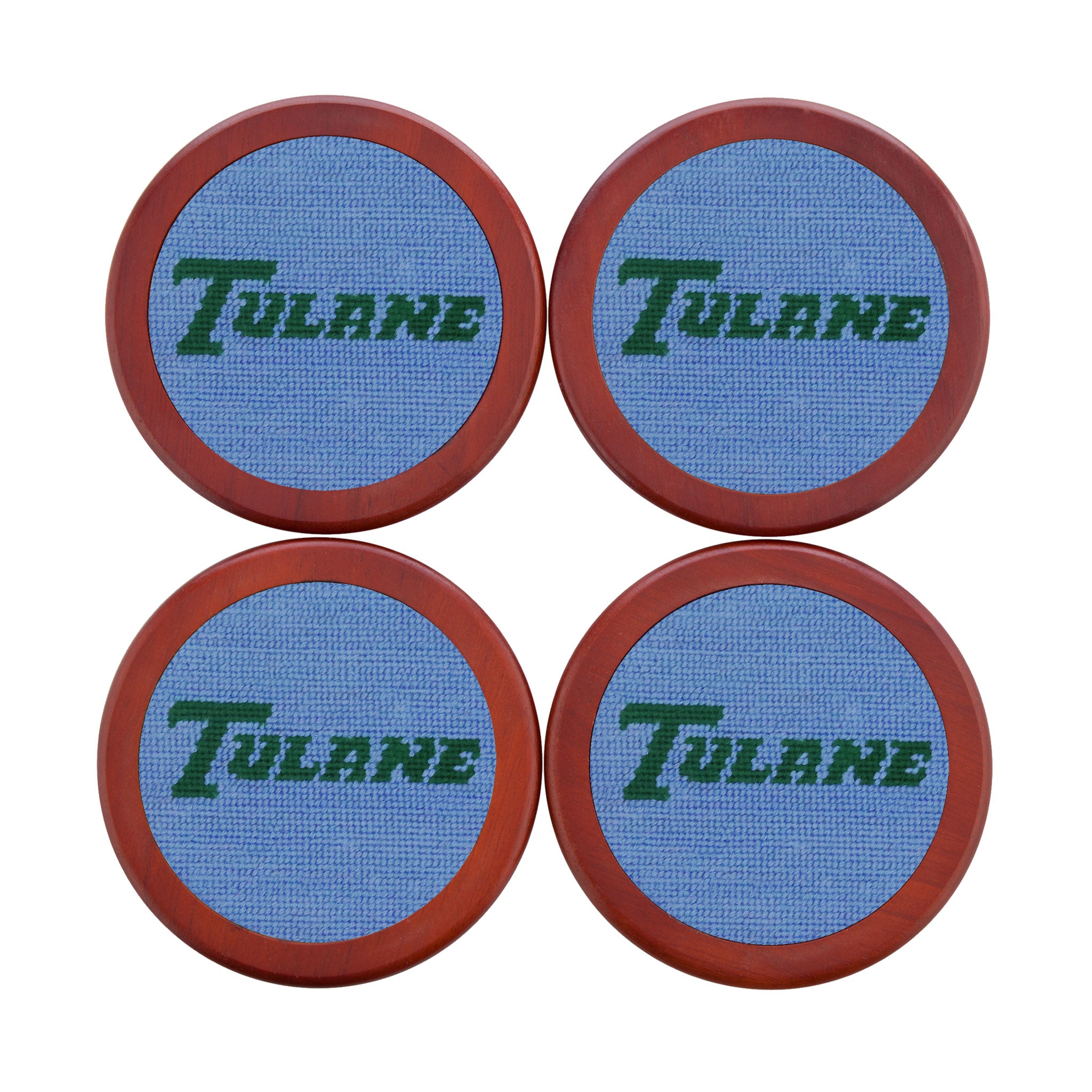 Tulane coaster set featuring the collegiate logo in baby blue and white needlepoint, shown laid flat.