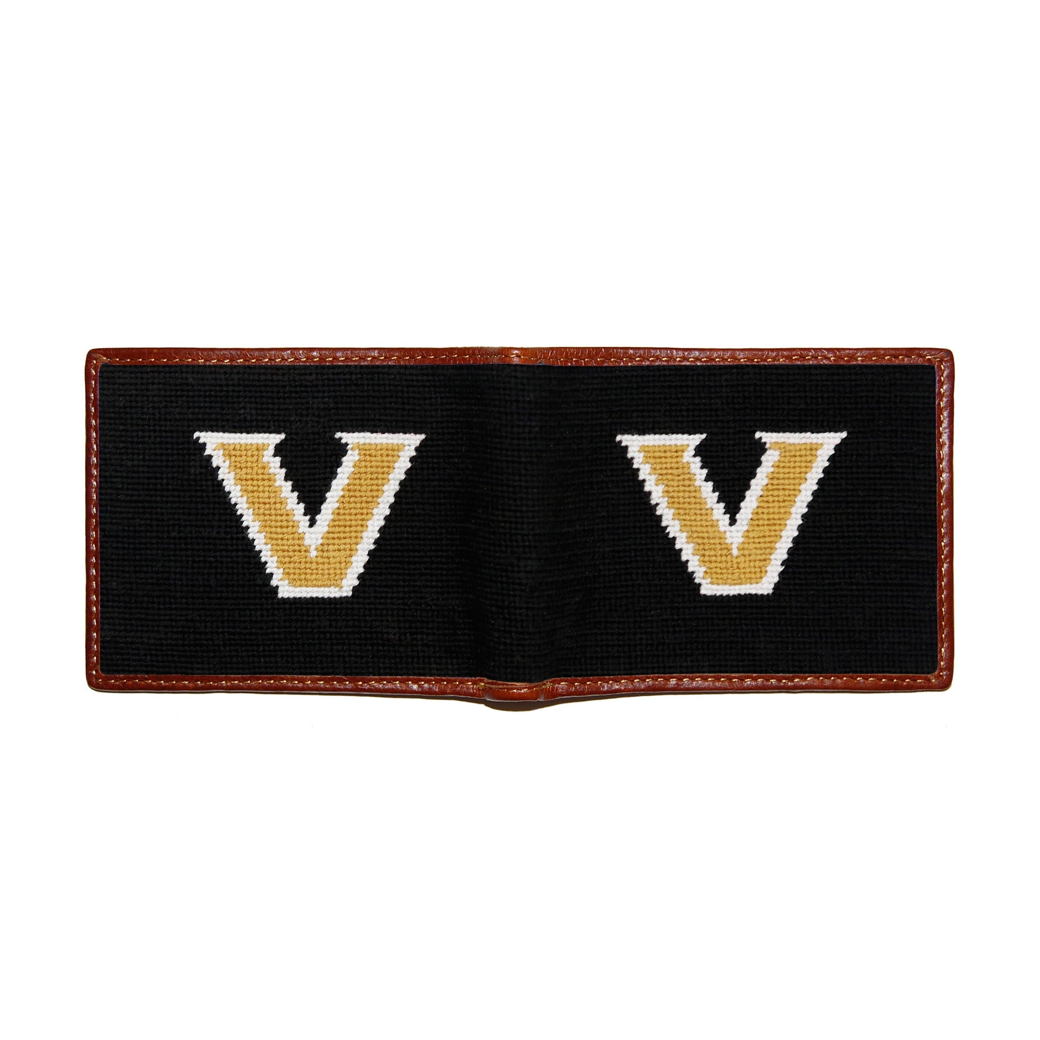 Dark navy Vanderbilt needlepoint bi-fold wallet with brown leather trim, open view showing both sides of needlepointing.