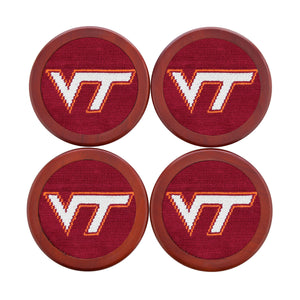 Virginia Tech coaster set featuring the collegiate logo in maroon and orange needlepoint, shown laid flat.