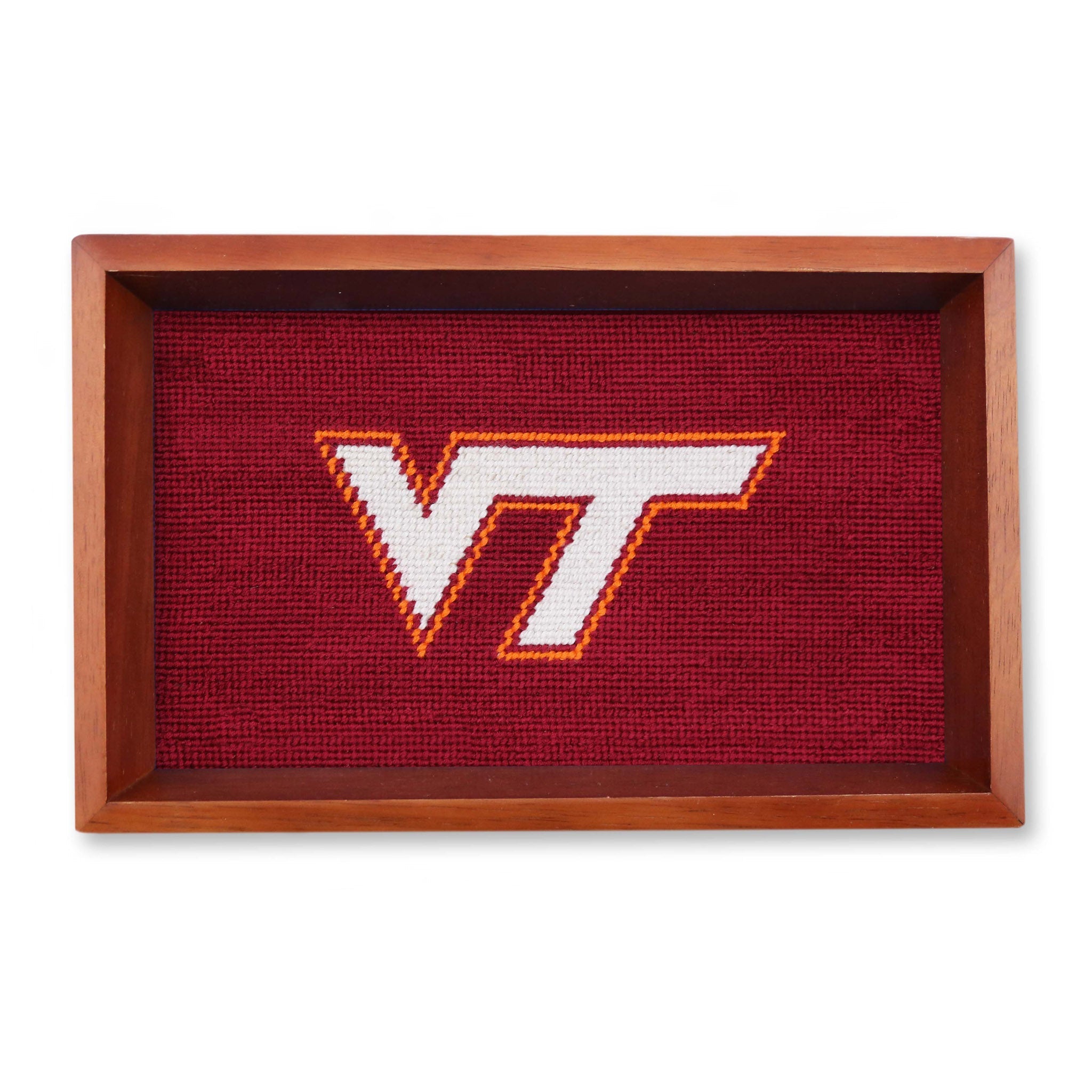 Virginia Tech chestnut wood valet tray with Virginia Tech needlepoint stitched logo in the base of the tray