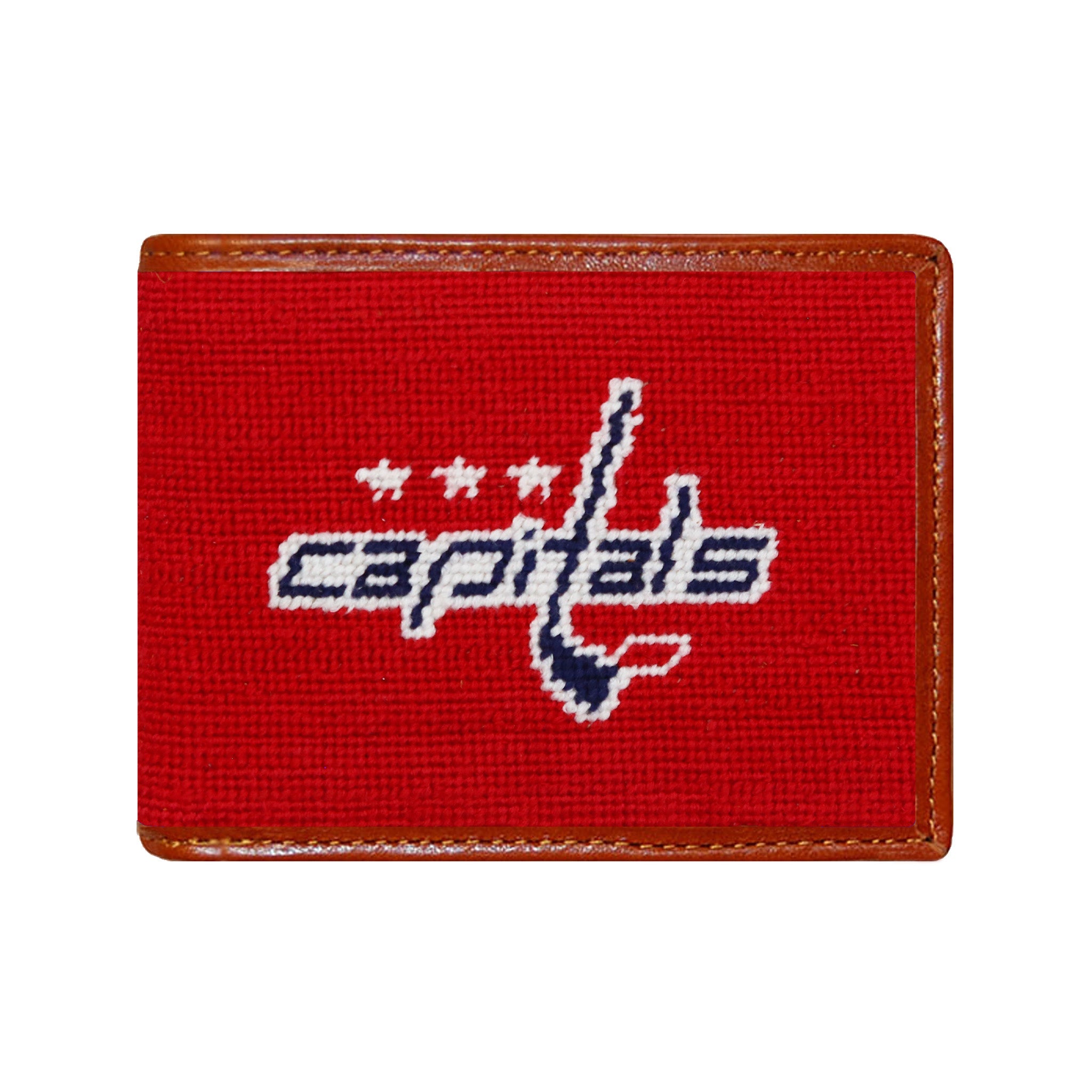 Washington Capitals red, white, and blue needlepoint bi-fold wallet with white “Caps” logo and brown leather trim, shown from primary angle.