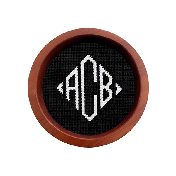 Black wine bottle coaster featuring Diamond 42 monogram