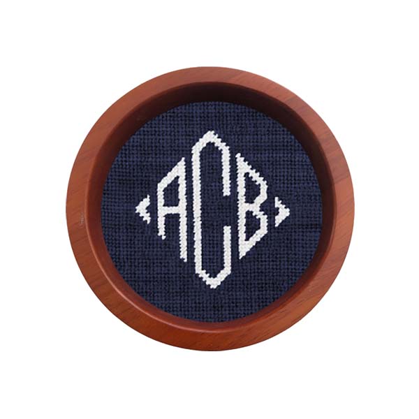 Dark navy wine bottle coaster featuring Diamond 42 monogram