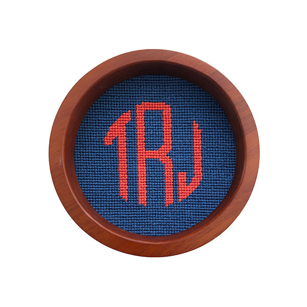 Blueberry wine bottle coaster with Circle 39 monogram stitched in the center