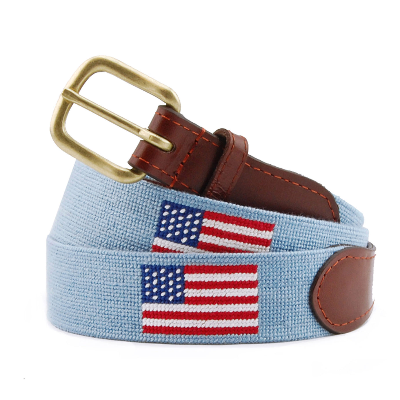 Monogrammed American Flag Needlepoint Belt Antique Blue coiled, with brown leather trim and a brass buckle