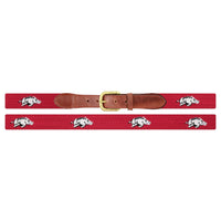 Flat view of Needlepoint Monogrammed Arkansas Belt Cranberry with brown leather trim and a brass buckle